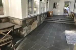 Photo of gray brick porch